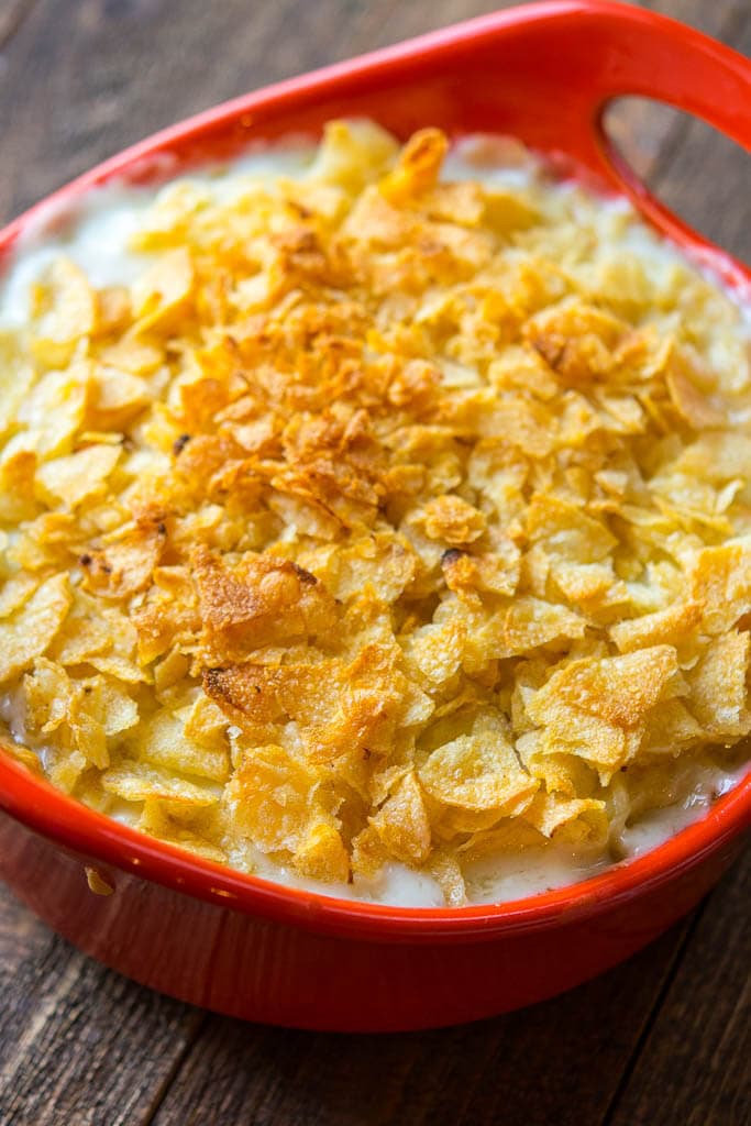 White Cheddar Beer Mac & Cheese in a round red casserole dish