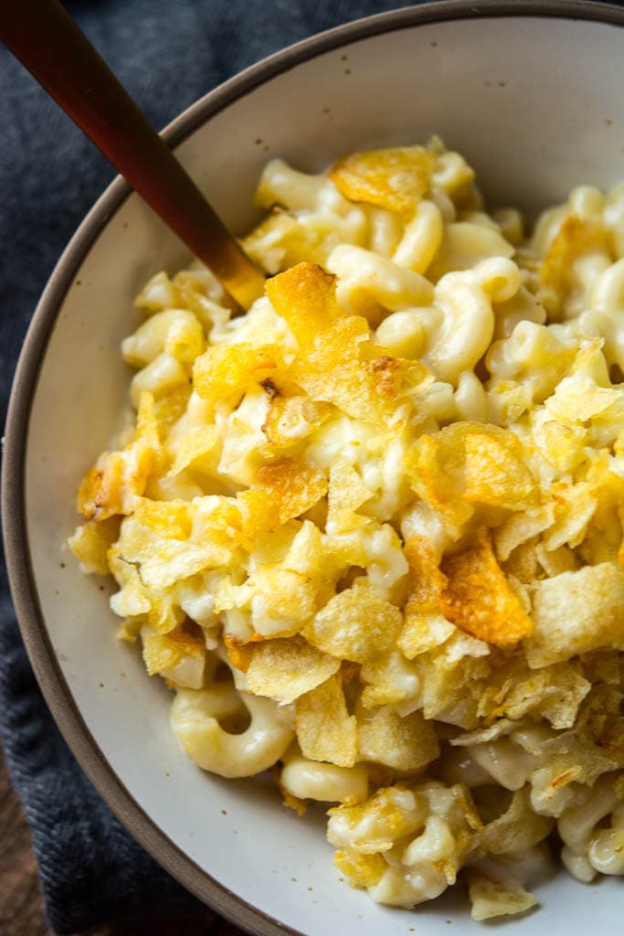 White Cheddar Beer Mac & Cheese in a white and gold bowl
