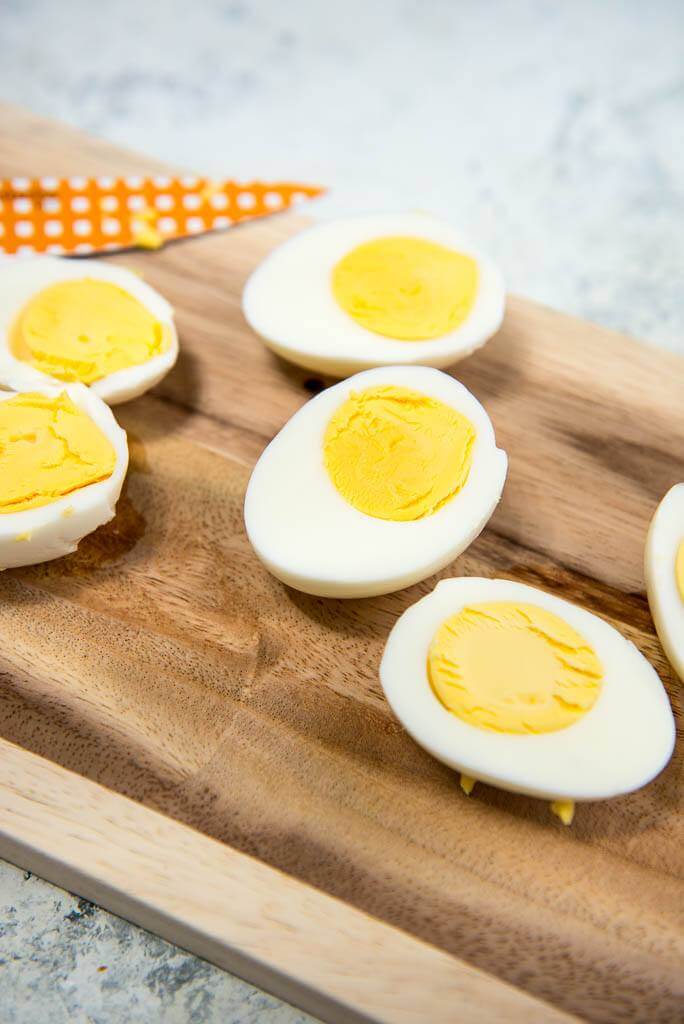 Perfect Instant Pot Hard Boiled Eggs Garnished Plate