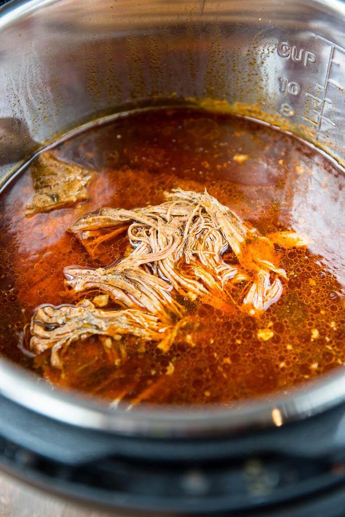 It's time to rethink the meaning of quick dinners! With this Pressure Cooker Brisket you can have amazing shredded beef perfect for sandwiches, tacos and more in just about an hour!
