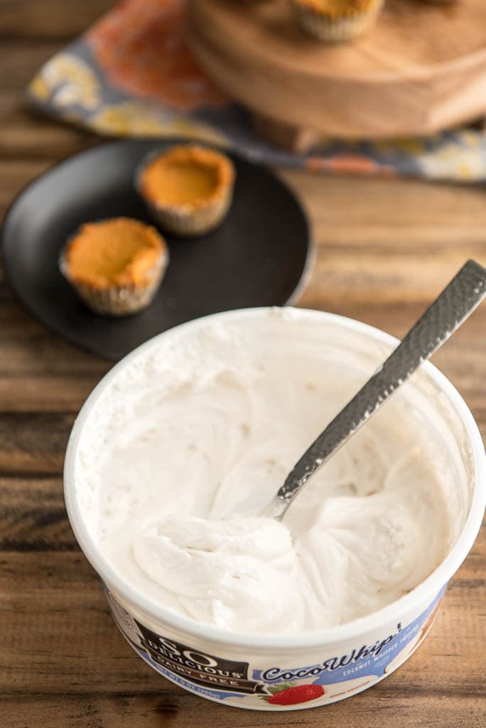 Container of coconut whipped topping.