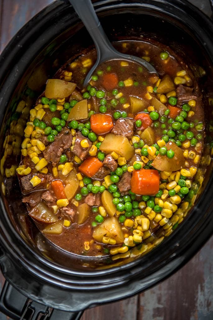 Slow Cooker Beef Stew overhead in black slow cooker