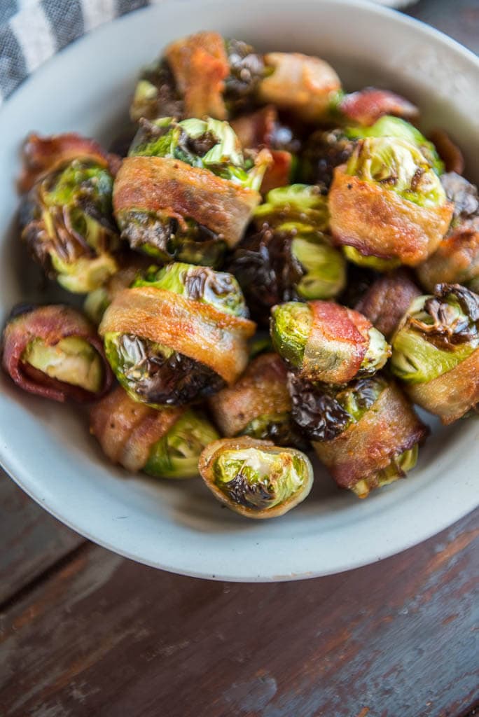 Air Fryer Bacon Wrapped Brussels Sprouts in gray bowl from overhead