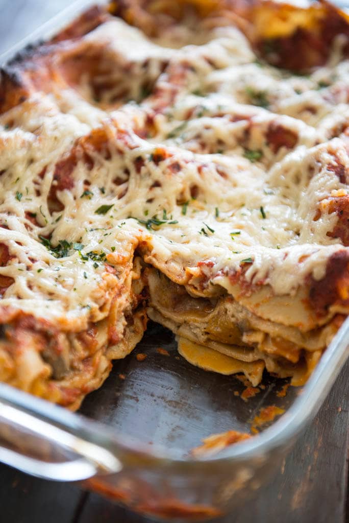 vegan lasagna with piece cut out in casserole dish