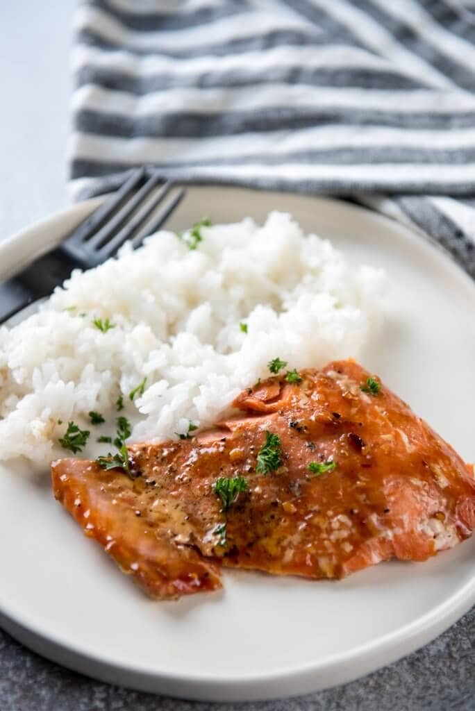 Korean BBQ Grilled Salmon on white plate with steamed rice