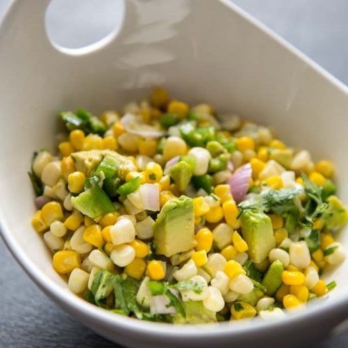 Avocado Corn Salsa in a white bowl