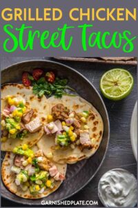 Want a meal that's sure to please a crowd or your family? How about these super simple Grilled Chicken Street Tacos! Garnish with Avocado Corn Salsa for a real treat! #garnishedplate #chickenthighs #tacos #streettacos #chickentacos