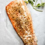 salmon filet baked in the oven with herbs