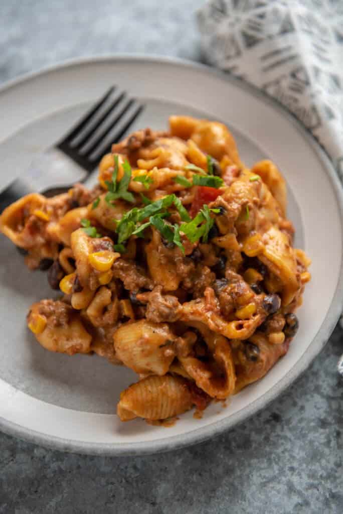 instant pot taco pasta on gray and white plate