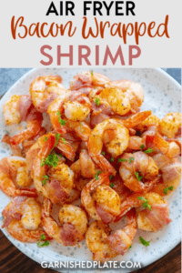 If you ever needed a reason to buy an air fryer, this is it!  You are only 4 ingredients and a few minutes away from Air Fryer Bacon Wrapped Shrimp which makes a delicious appetizer or a quick snack or dinner! #airfryer #shrimp #bacon