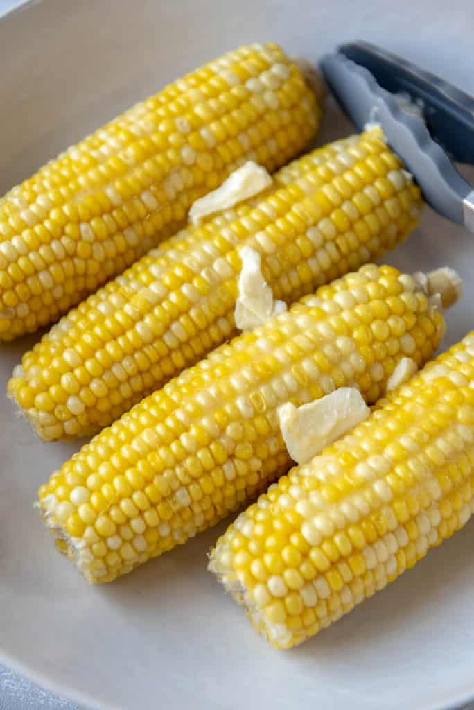 corn on the cob topped with butter