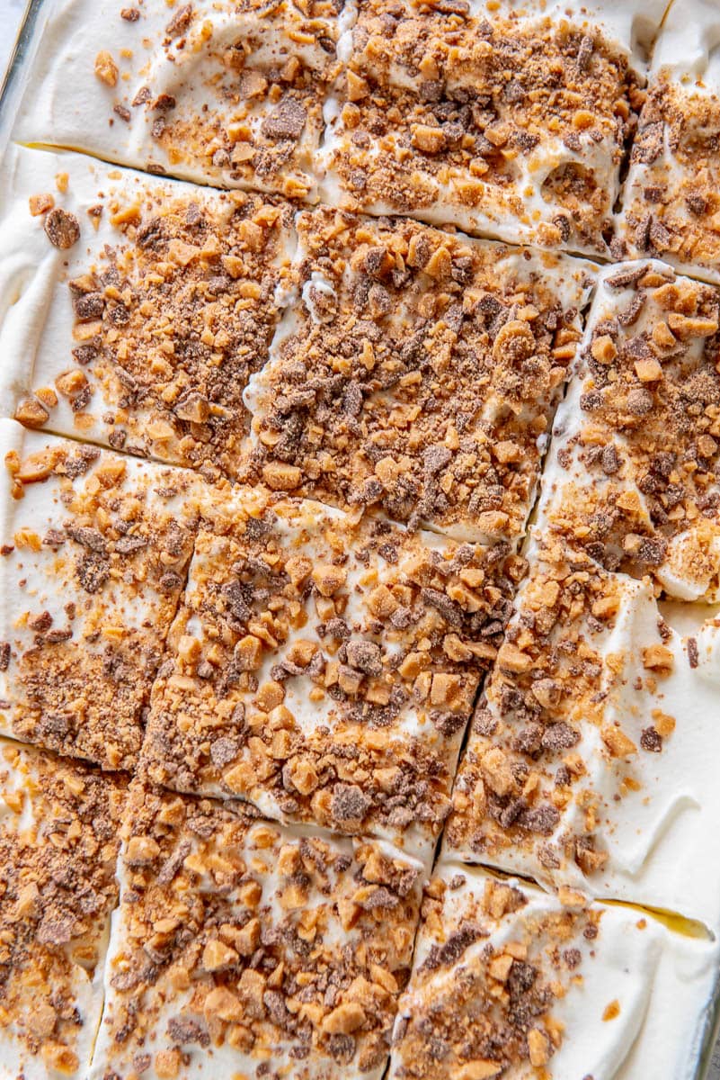 square slices of icebox cake in casserole dish