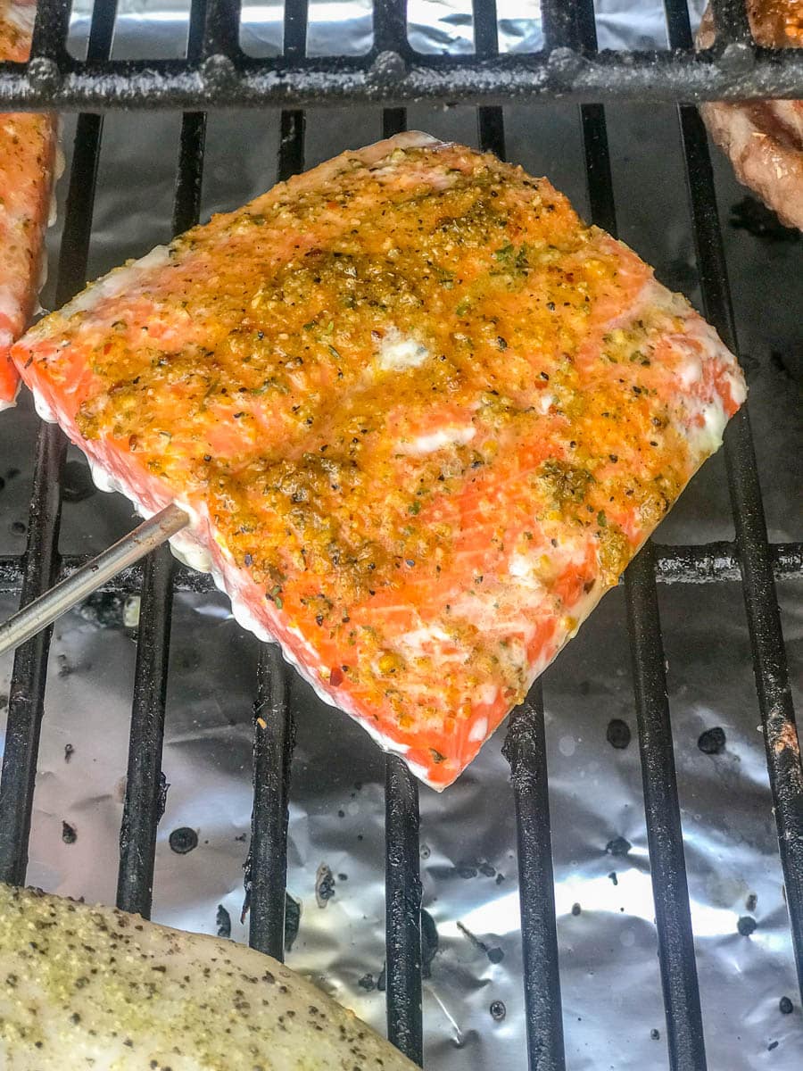 salmon on the grill with temperature probe