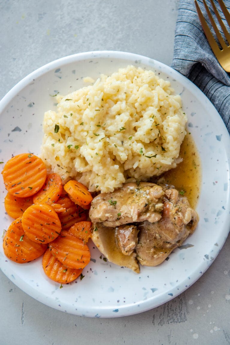 Instant Pot Chicken Thighs with Gravy Garnished Plate