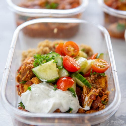 rectangle plastic food container with moroccan chicken and cucumbers