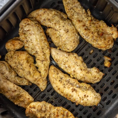 cooked chicken tenderloins in air fryer basket