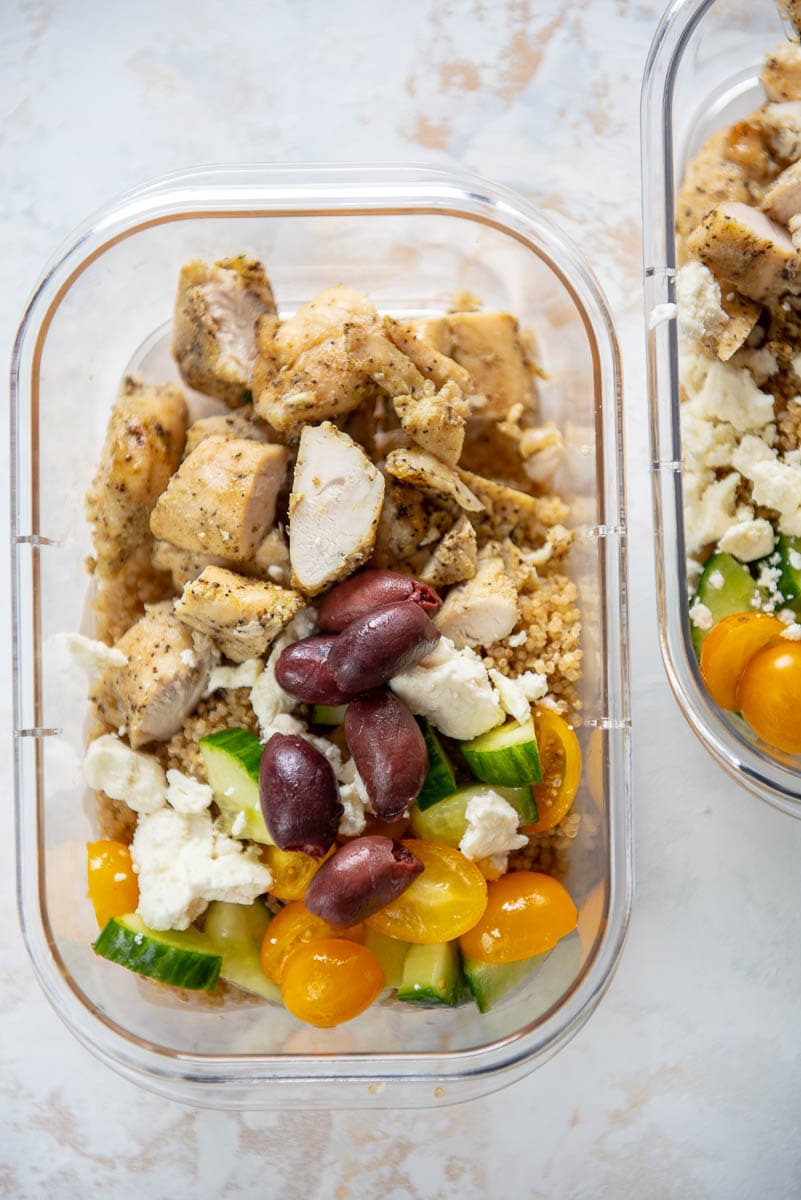 greek chicken bowls in meal prep containers