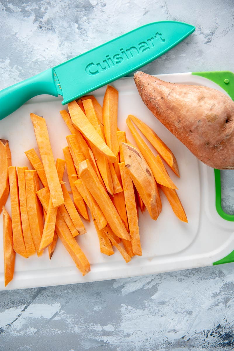 cutting board with sweet potatoes for fries