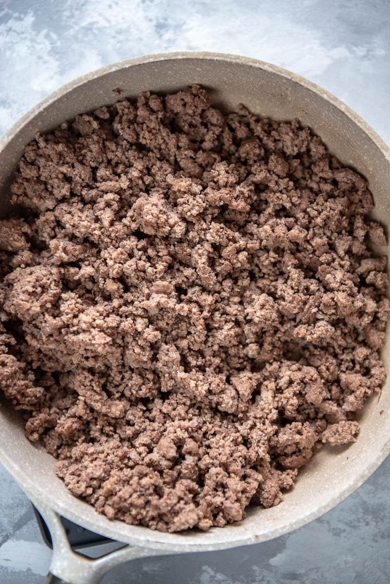 browned ground beef in skillet