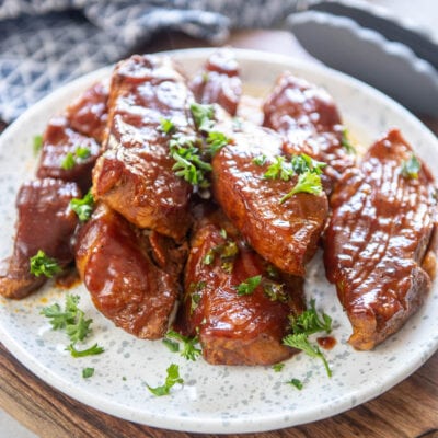 beef ribs on a white plate