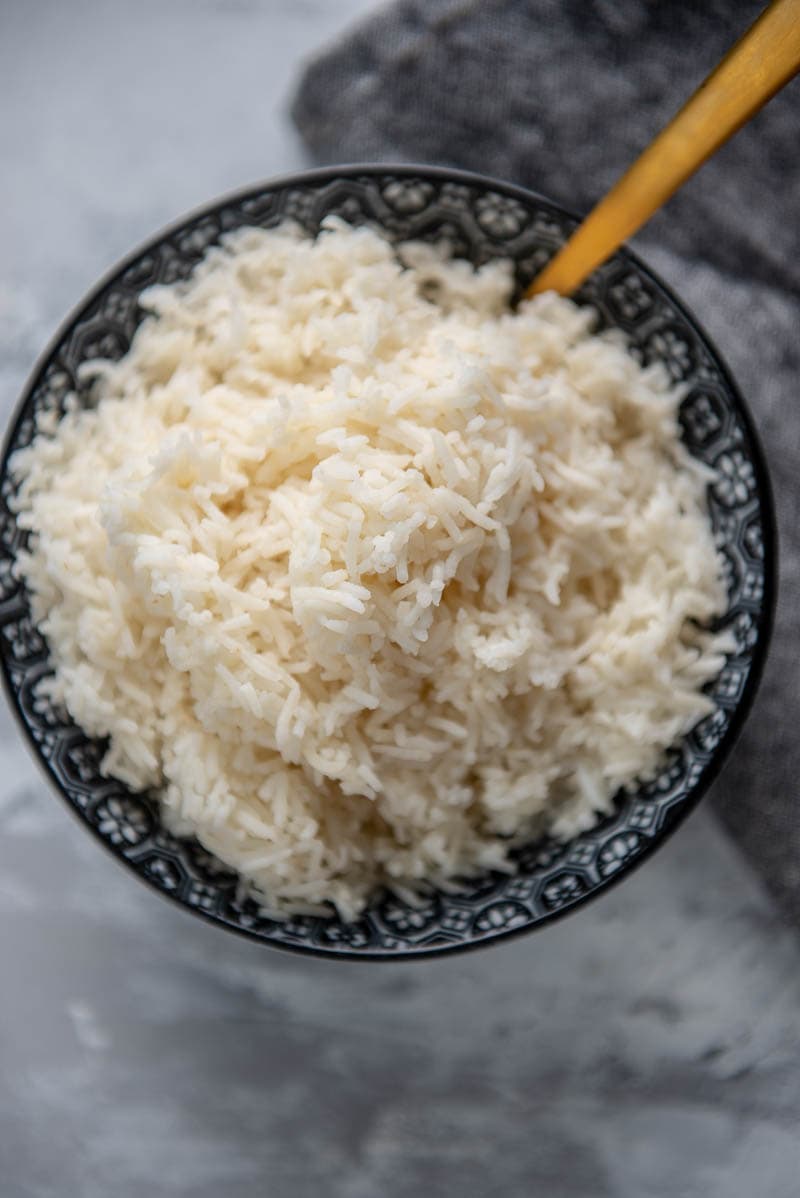 cooked basmati rice in a bowl with spoon