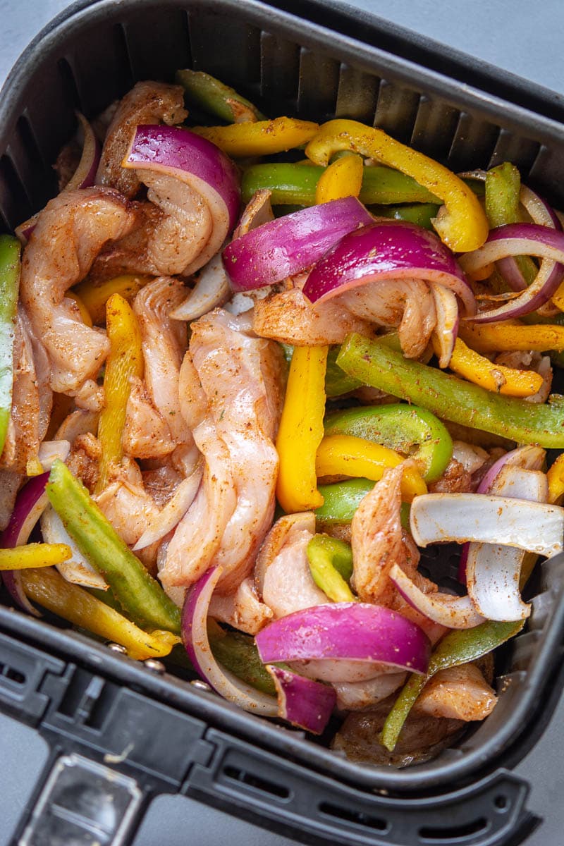 chicken and veggies for fajitas in an air fryer