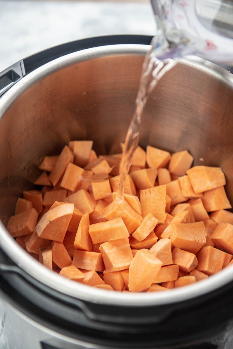 cubed sweet potatoes and water in an instant pot