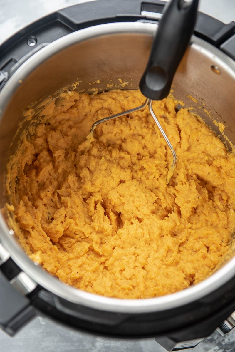 sweet potatoes and masher in instant pot