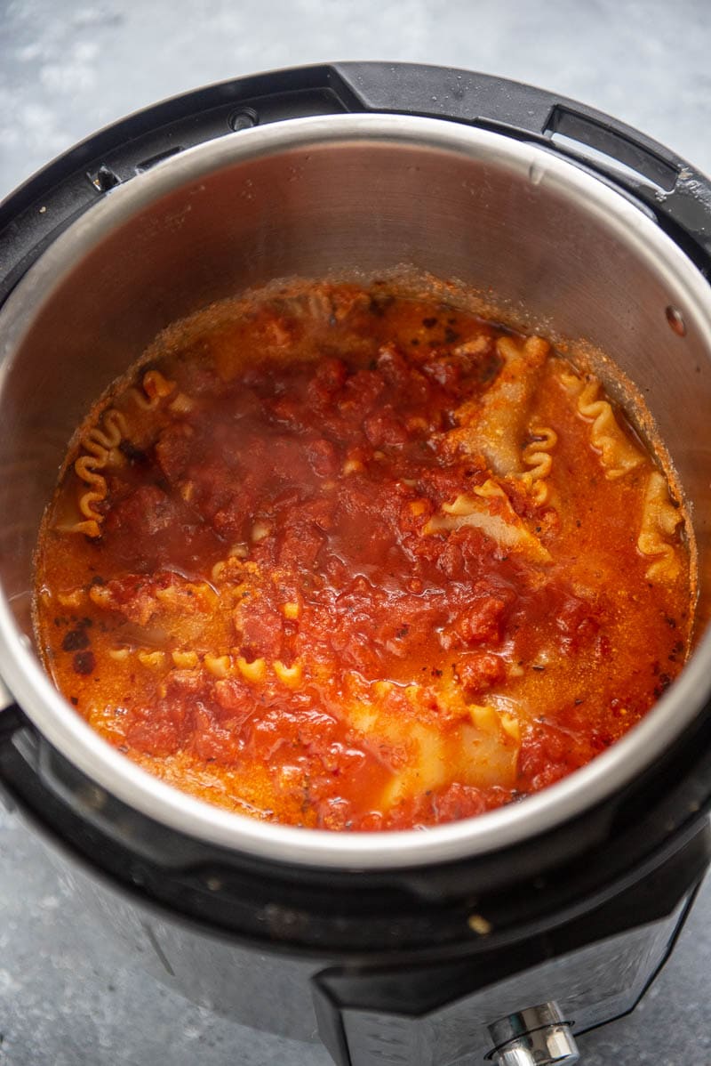 cooked lasagna noodles and sauce in Instant Pot