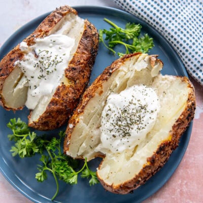 air fryer baked potatoes on a plate