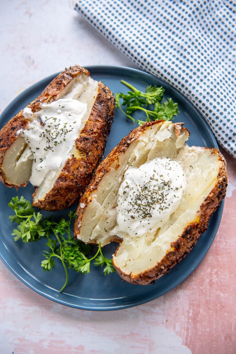air fryer baked potatoes on a plate