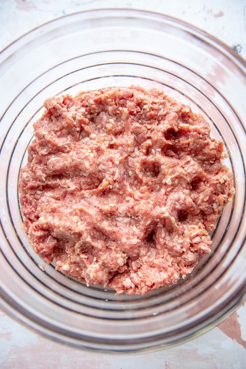 bowl of ground meat mixture for meatloaf