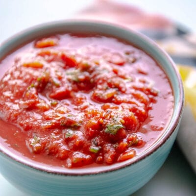 turquoise bowl filled with red salsa