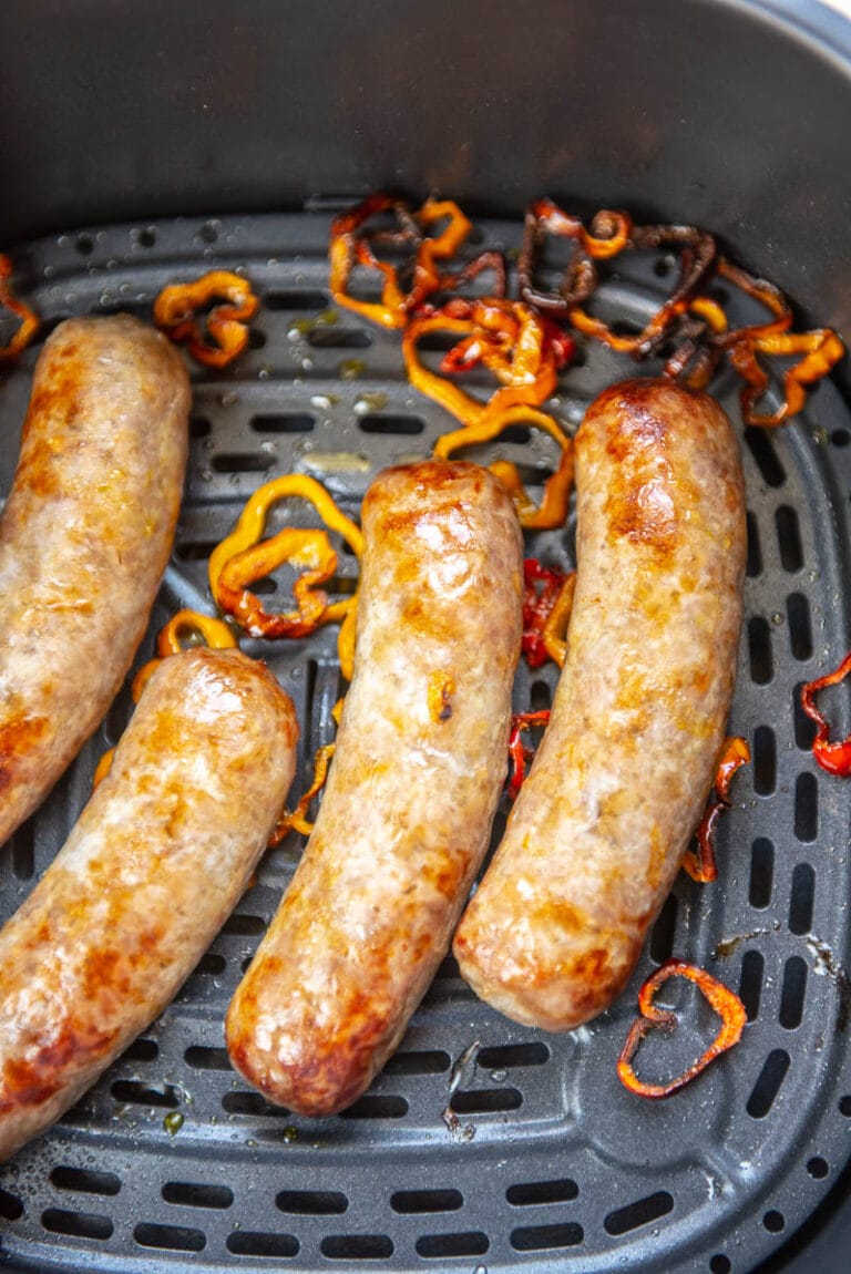 4 bratwurst and peppers cooked in air fryer basket
