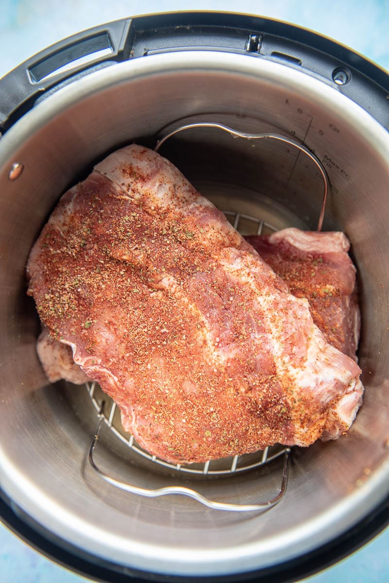 ribs ready to cook on rack in instant pot