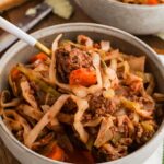 beef and cabbage with carrots in bowl