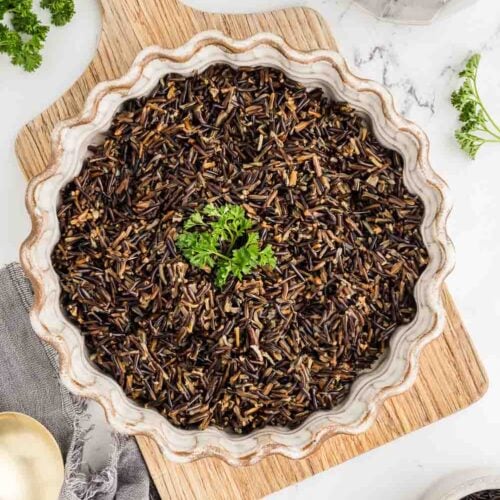 Instant Pot Wild Rice served and garnished in large bowl