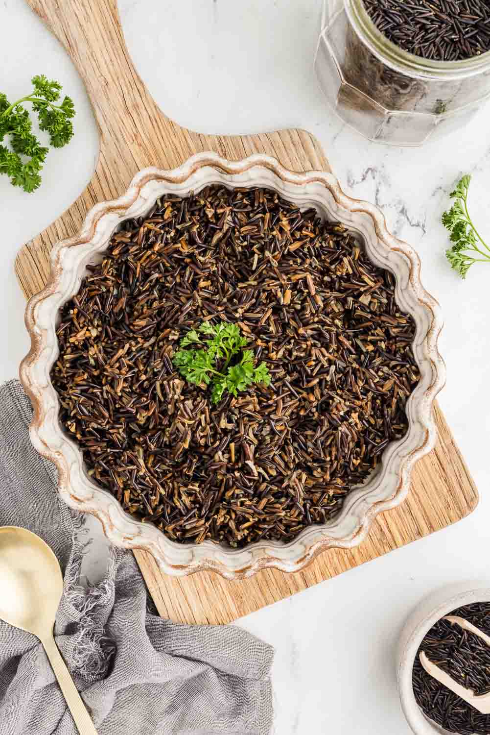 Instant Pot Wild Rice served and garnished in large bowl
