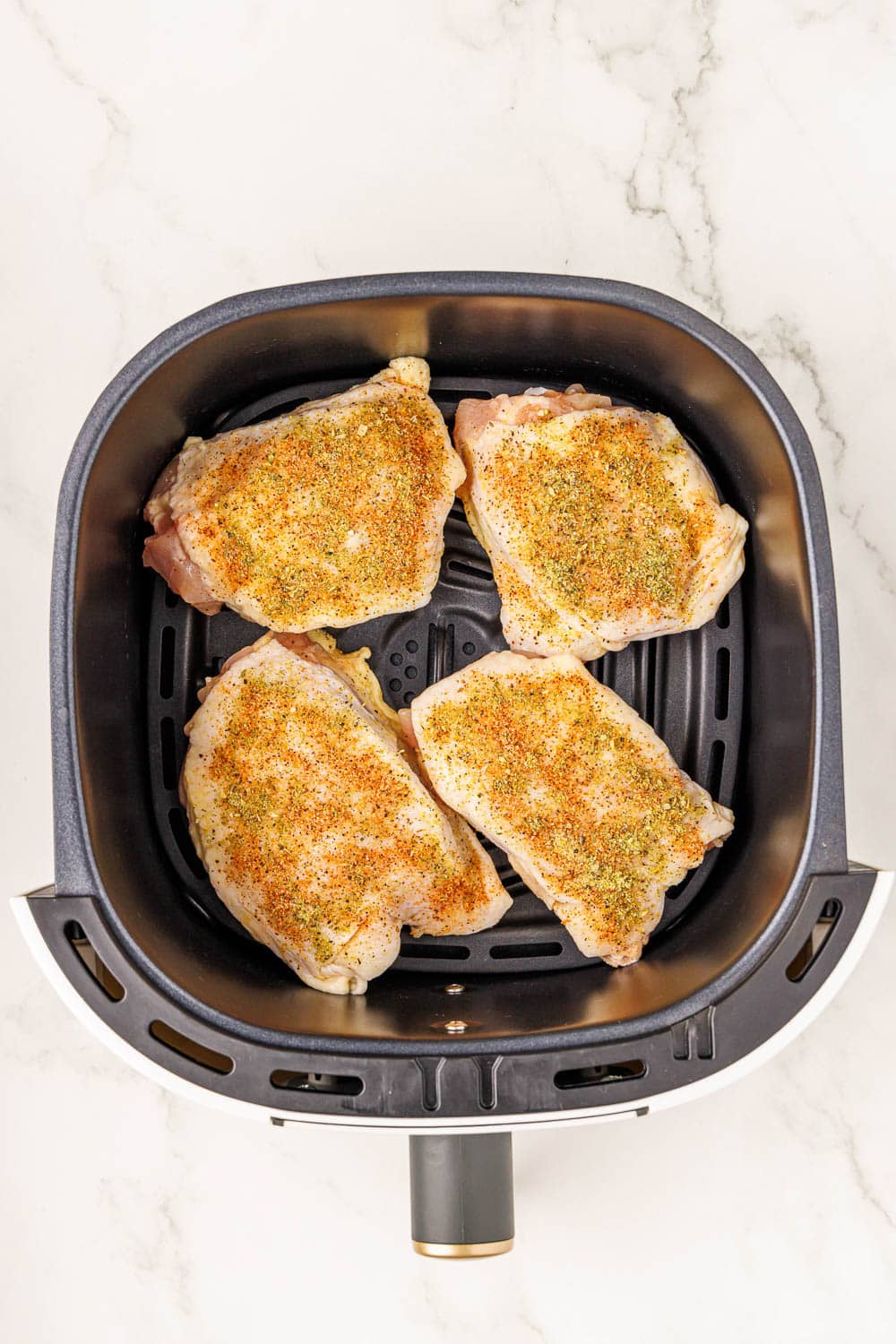 4 raw bbq chicken thighs in air fryer