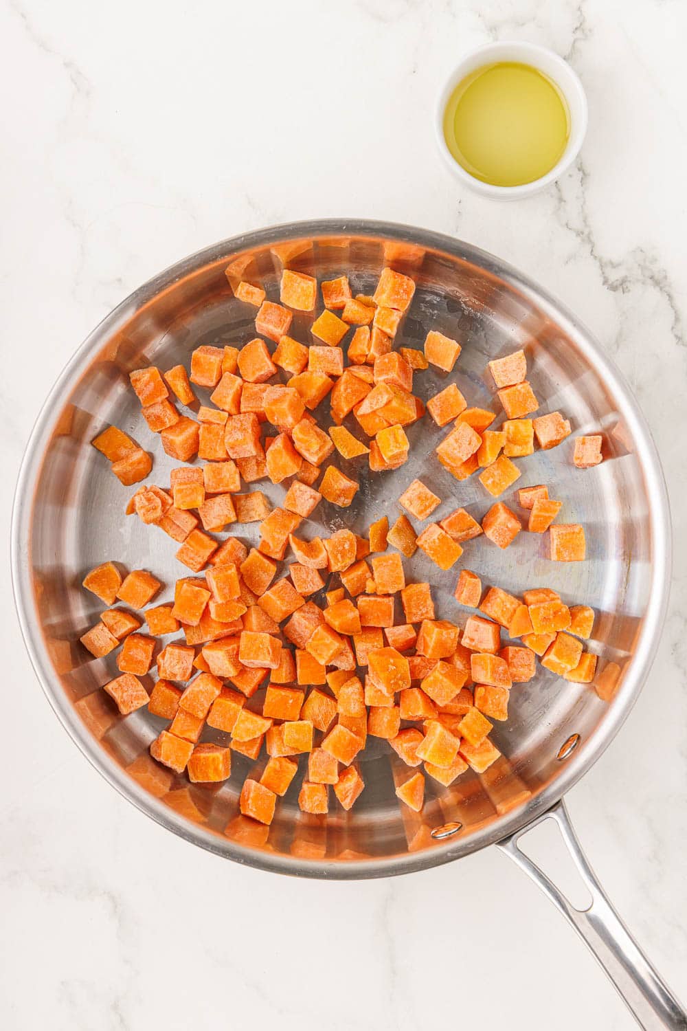frozen sweet potatoes cubed on pan