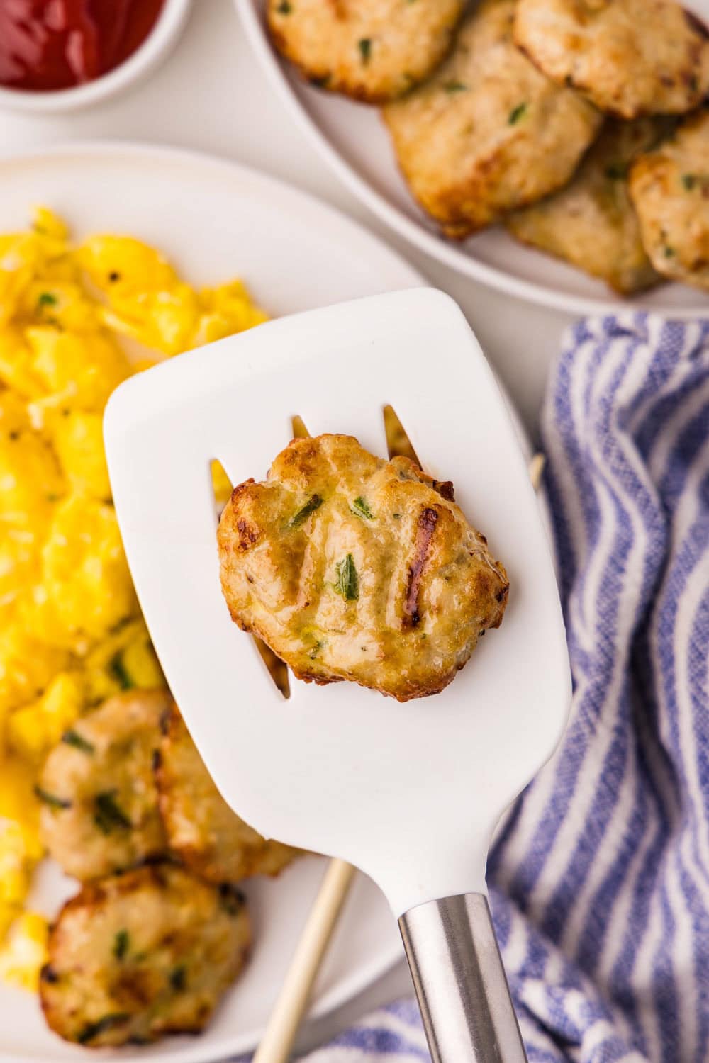 Air Fryer Sausage Patties on spatula