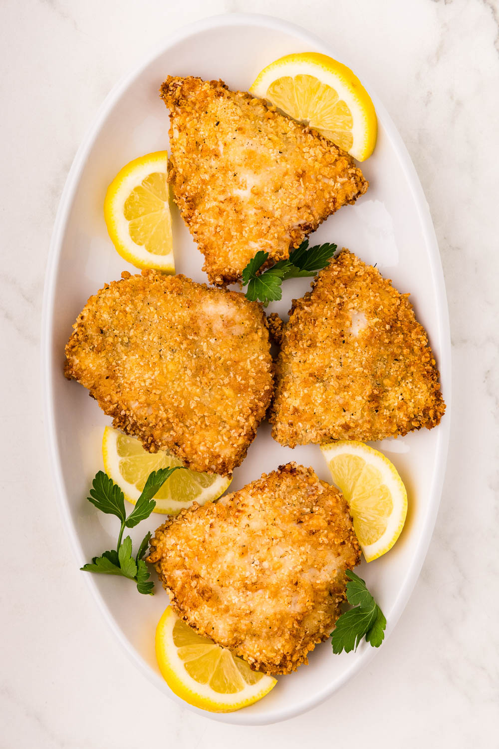 Served Crispy Air Fryer Chicken Cutlets garnished
