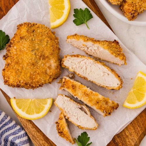 Served Crispy Air Fryer Chicken Cutlets garnished sliced