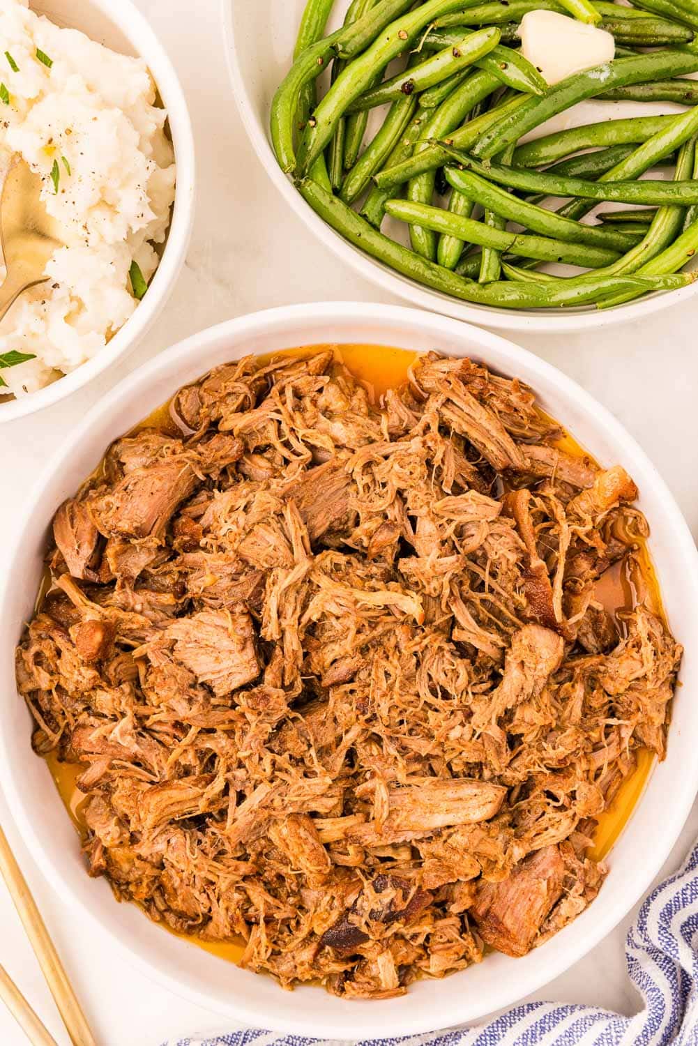 Dutch Oven Pulled Pork Recipe served with mashed potatoes and green beans