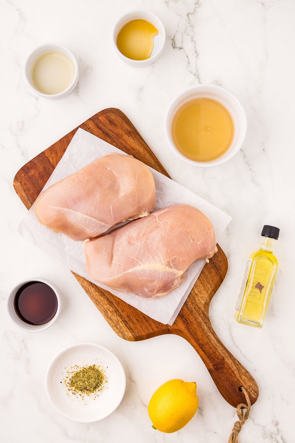 1 pound thin sliced chicken breasts 2 eggs 1 tablespoon cajun seasoning blend 1 tablespoon herb and garlic seasoning blend 1 cup panko breadcrumbs (regular or gluten-free) ¼ cup grated parmesan cheese Avocado oil cooking spray in counter