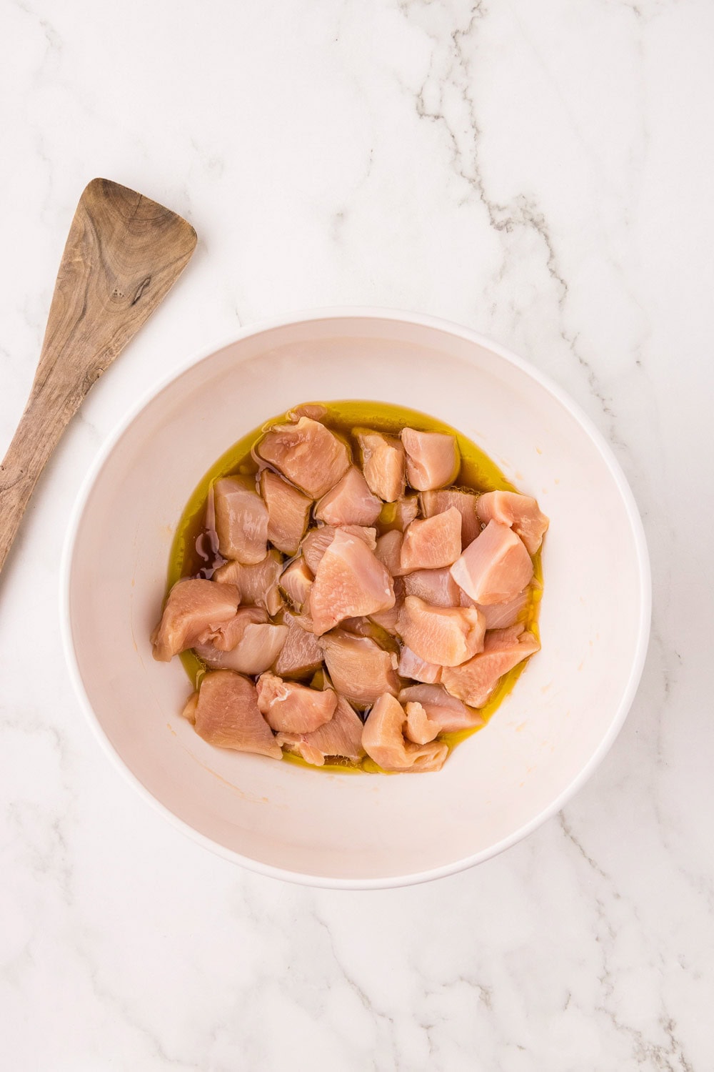 Raw Herb Marinated Air Fryer Chicken Skewers in bowl