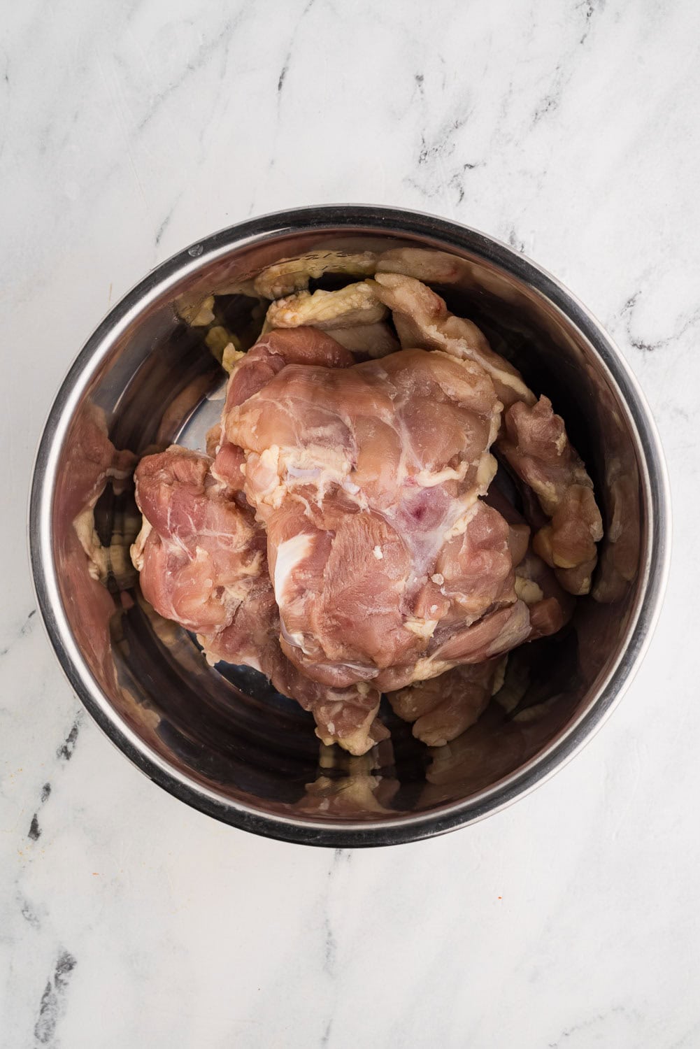 instant pot with raw chicken thighs