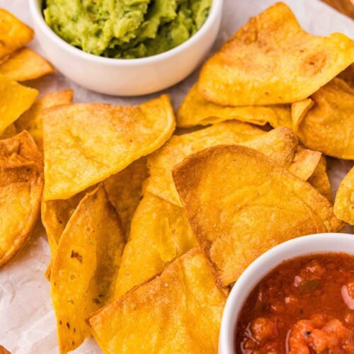 crispy tortilla chips with salsa and guacamole