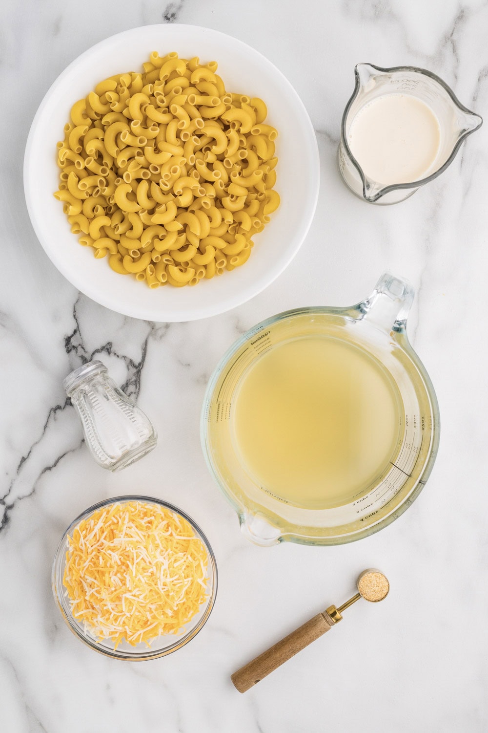 Ingredients for cheesy macaroni and cheese