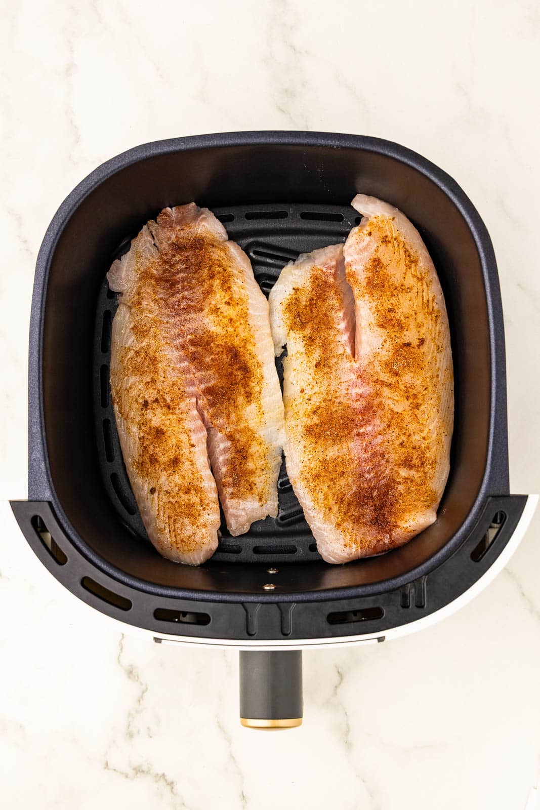4 seasoned tilapia filet in air fryer